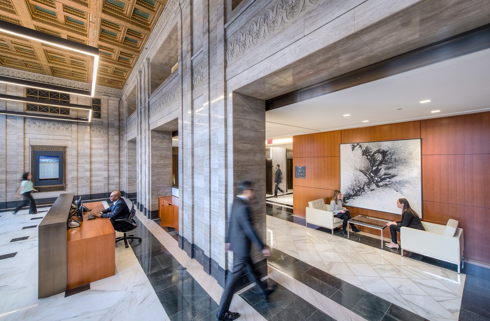 Image of the seating, elevators and ornate finishes in the lobby of 1500 K Street, downtown DC